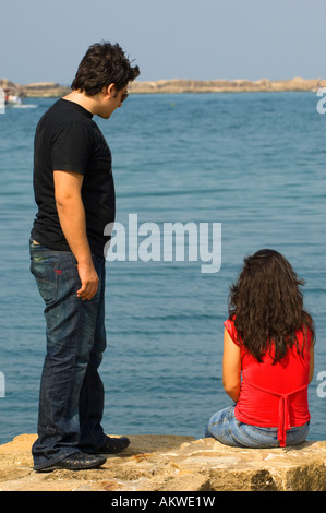 Coppia giovane problemi mare Foto Stock