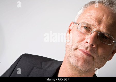 Ritratto di un uomo d affari con occhiali Foto Stock