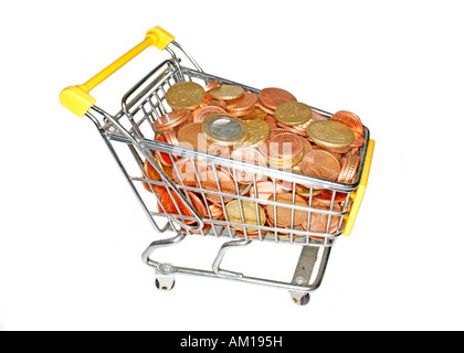 Piccolo shopping-carrello riempito con le monete Foto Stock