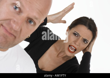 La donna è fare la predica un uomo Foto Stock