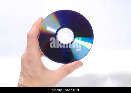 Mano che tiene un CD Foto Stock