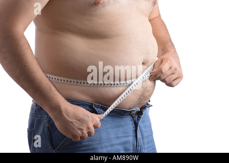 Fat man tenendo un nastro di misurazione Foto Stock