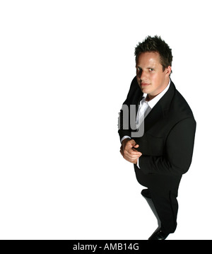 Uomo in costume nero su sfondo bianco Foto Stock