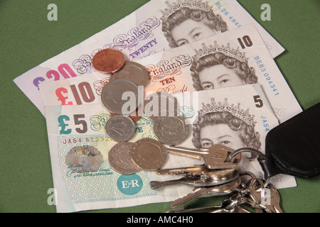 Banconote, modificare e chiavi Foto Stock