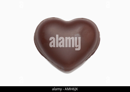 Forma di cuore dolce al cioccolato close up Foto Stock