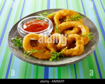 Fritti pastellati anelli di cipolla Foto Stock