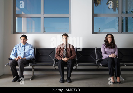 La gente di affari in Area di attesa Foto Stock
