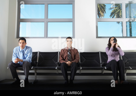 La gente di affari in Area di attesa Foto Stock