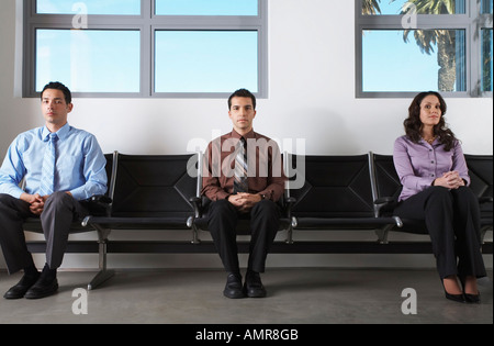 La gente di affari in Area di attesa Foto Stock