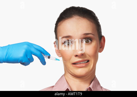 Donna ottenere iniezione di Botox Foto Stock