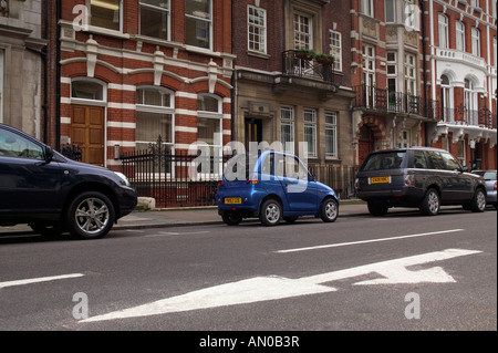 G Wiz elettrico auto parcheggiate nel central London REGNO UNITO Foto Stock