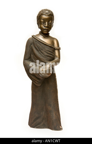 Figurine di bronzo statua di un giovane ragazzo Foto Stock