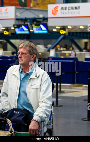 Air China sportello check in e BJS PEK all'Aeroporto Internazionale Capital di Pechino CINA Foto Stock