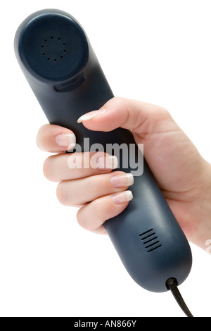 Mano femminile in possesso di un ricevitore di telefono. Isolato su uno sfondo bianco. Foto Stock
