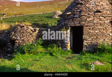 Beehive case testa Slea penisola di Dingle Contea di Kerry Irlanda Foto Stock