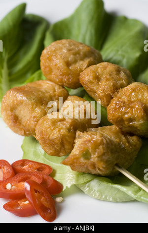 Malaysian fritte torte di granchio su spiedini Foto Stock