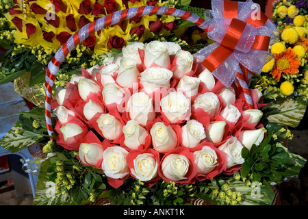 Pressione di stallo di fiori Psar Thmei mercato Phnom Penh Cambogia Foto Stock