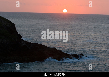 Cornish tramonto sul mare Foto Stock