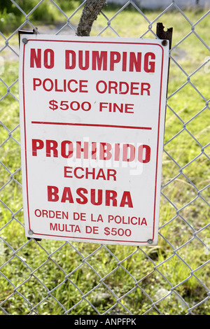 Miami Florida,segno,no dumping,ordine di polizia,fine,lingua spagnola,bilingue,FL071213041 Foto Stock