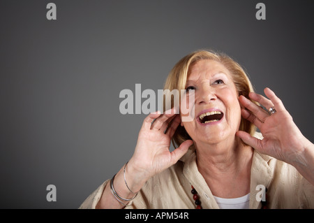 Studio ritratto di una donna, espressioni Foto Stock