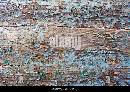 Vernice pelata su pannelli di legno da lo scafo di una barca Foto Stock