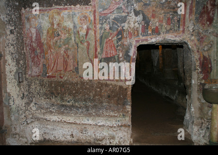 Parete di dipinti, rock chiesa Madonna del Parto, Sutri, Lazio, Italia Foto Stock