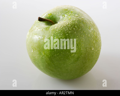 Uncut mela verde. Golden Delicious Foto Stock