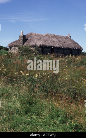 Musica tradizionale scozzese nero della casa sull'isola di ulva, Mull. Questo è di sheila cottage, un piccolo museo di vita tradizionale. Foto Stock