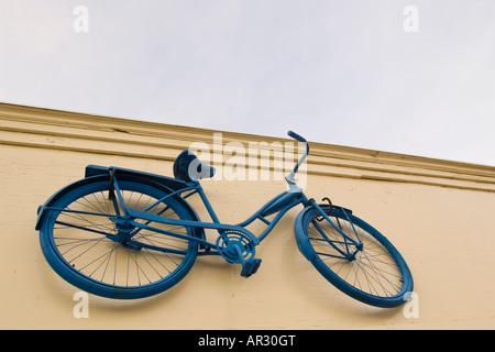 Una bicicletta è il segno di una bicicletta a noleggio business sull isola di Mackinac nel Michigan Foto Stock
