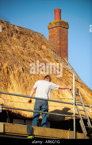 La Thatcher al lavoro sul tetto Foto Stock