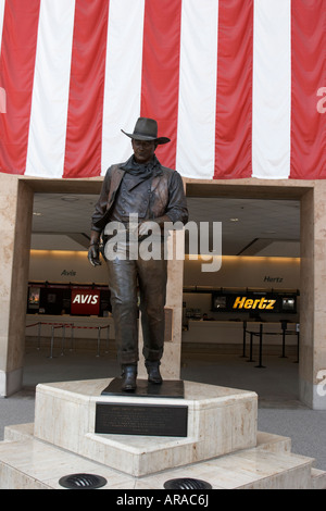 Una statua di John Wayne all'aeroporto John Wayne a Irvine CA Foto Stock