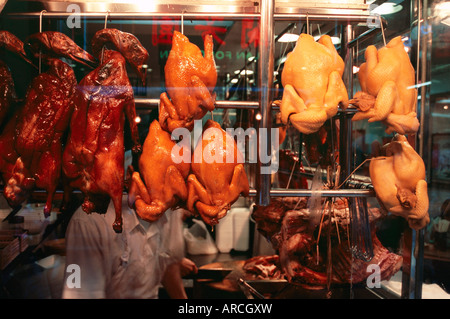 Cuocere anatra alla pechinese visualizzato nella finestra del ristorante, Hong Kong, Cina, Asia Foto Stock