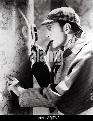 BASIL RATHBONE nel suo classico film di ruolo come Sherlock Holmes Foto Stock