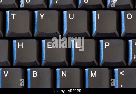 I tasti sulla tastiera di un computer formante la parola 'aiuto' Foto Stock