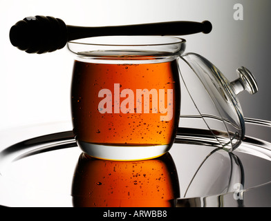 Vasetto di miele e bilanciere Foto Stock