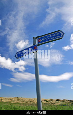 Druridge Bay e Ashington Cresswell strada segno vicino Druridge Bay Northumberland Regno Unito Foto Stock