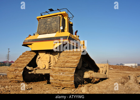 Bulldozer al sito in costruzione Foto Stock