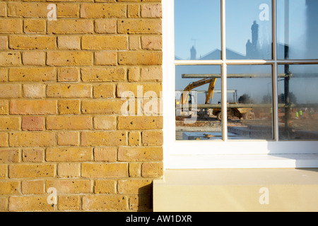 Costruzione di opere sul Poundbury estate città di Dorchester Dorset England Regno Unito Foto Stock