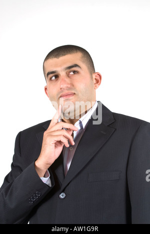 Business man mano sul mento cercando Foto Stock