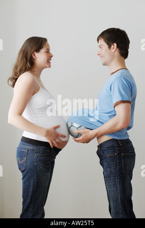 La donna incinta e il partner Foto Stock