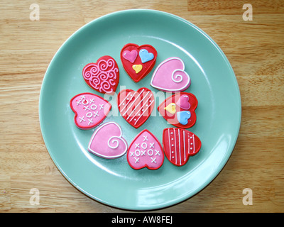 A forma di cuore biscotti rosa Foto Stock