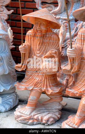 Asia far East Vietnam , montagna di marmo , Ngu Hanh Son , sculture tradizionali vietnamite o statue di pescatori in vendita in fabbrica Foto Stock