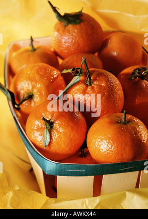 Le clementine in basket Foto Stock