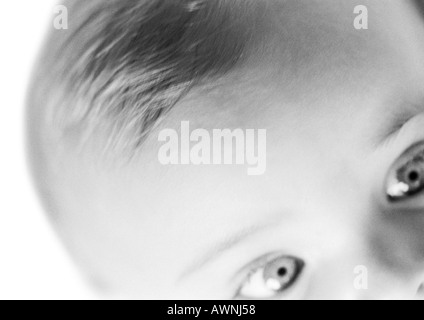 Vista parziale del bambino faccia, close-up, B&W. Foto Stock