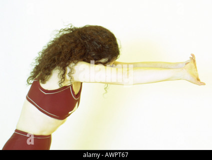 Donna stretching Foto Stock