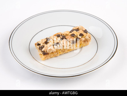 Tracker snack bar di dadi con scaglie di cioccolato e di avena Foto Stock