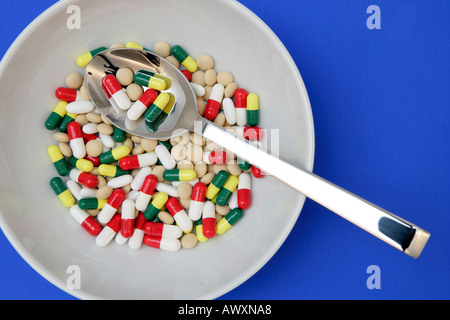 La colazione ciotola contenente farmaci farmaceutici Foto Stock