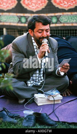 Leader di preghiera, Ashura rituali, penitente processioni, Isfahan, Iran Foto Stock