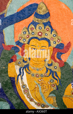 Dettaglio di un buddista ornati murale su una roccia a Drepung, Monastero, Lhasa, in Tibet Foto Stock