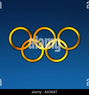 Golden anelli olimpici contro blu profondo sfondo graduate Foto Stock